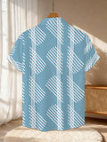 New Men'S Casual Short-Sleeve Shirt with a Blue Background And White Diagonal Striped Symmetrical Layout, Creating a Neat Geometric Pattern. Suitable for Festive Gatherings And Commuting
